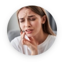 Blonde woman with a toothache