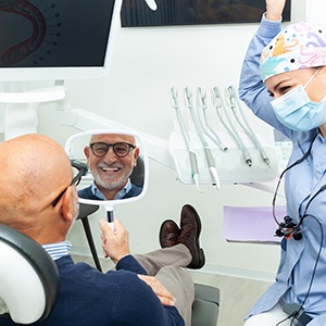 Older man happy with the health and aesthetics of his smile 